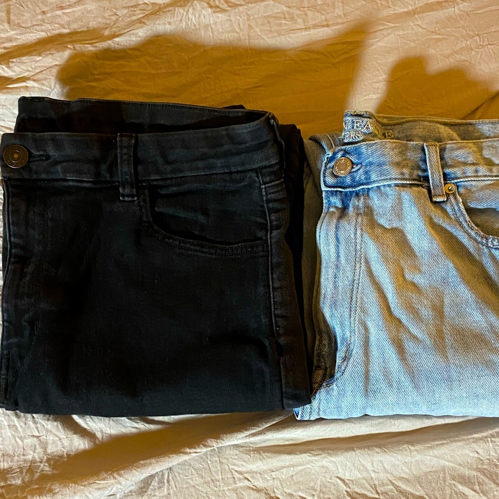 TWO PAIRS OF AMERICAN EAGLE JEANS!